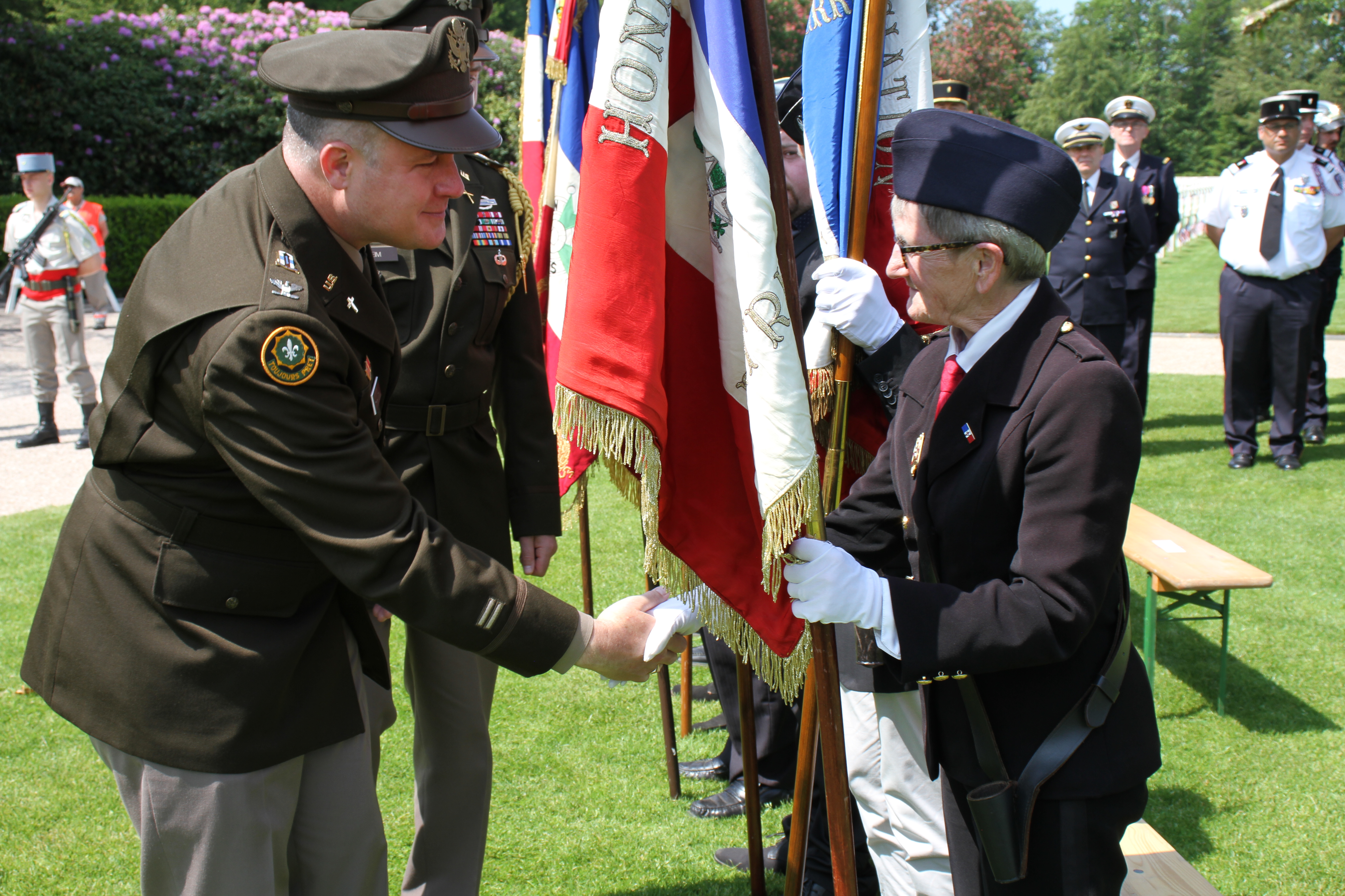 Chaplain (Col.) Robert Allman, assigned to the 21st Theater Support Command, thanks a member of the French honor guard following the Memorial Day ceremonies at Epinal American Cemetery in Dinoze, France, on May 28, 2023. U.S. Army photo by Arthur McQueen.