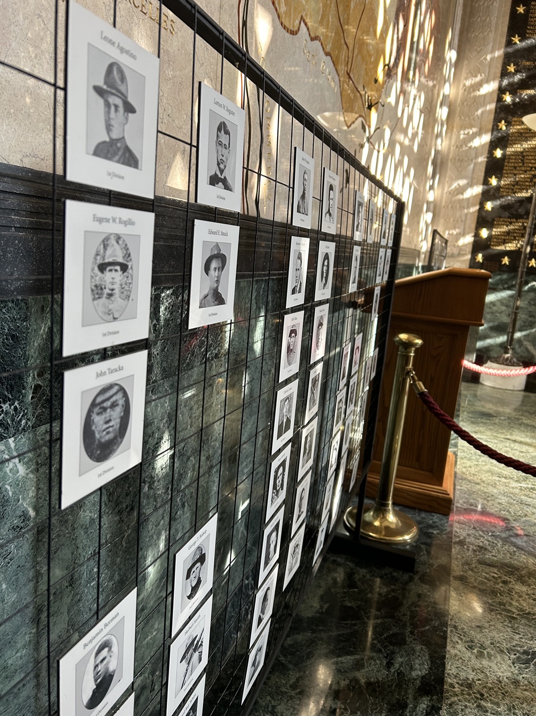 Portraits were also exhibited inside the memorial chapel where visitors can see the Wall of the Missing.