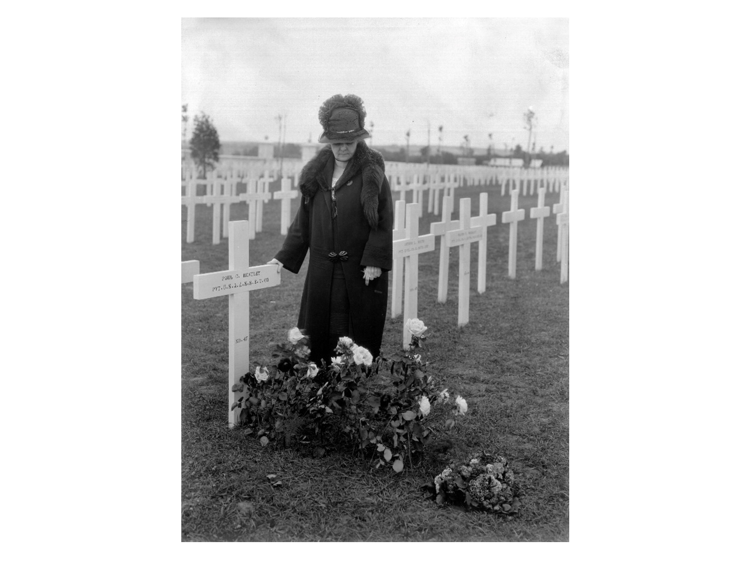 Josephine L. Bentley in front of her son's temporary headstone