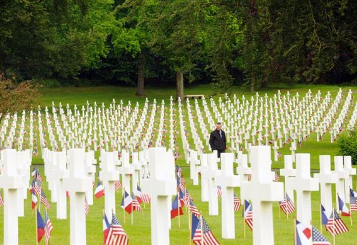 An American and French flag are at the base of every headstone.