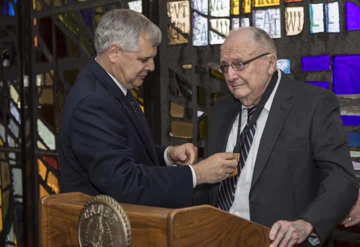 ABMC Acting Secretary Robert J. Dalessandro presents award to John J. Marsh.