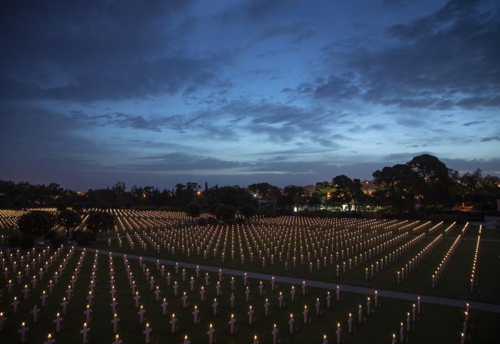 Thousands of headstones had burning candles on top for the Luminary. 