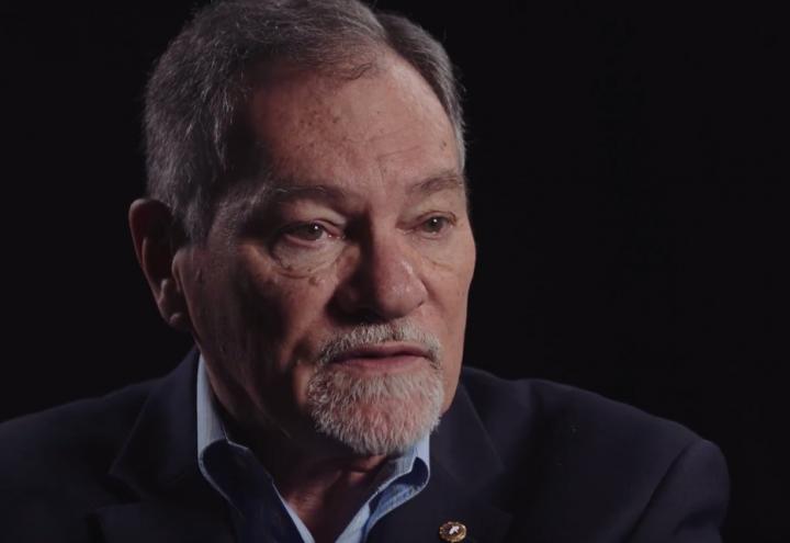 Chiodo sits against a black backdrop. 