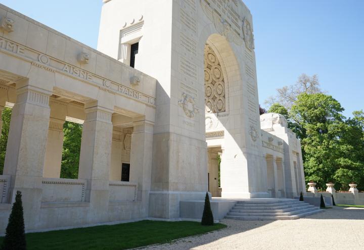 Ornate stone work fills the facade of the memorial building. 