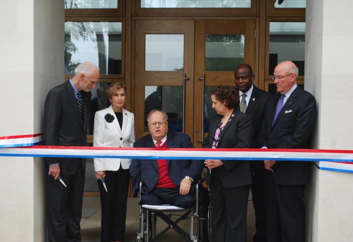 ABMC Commissioners prepare to cut the ribbon outside the new visitor center. 