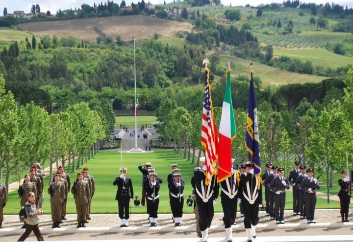 A color guard participates in the ceremony. 