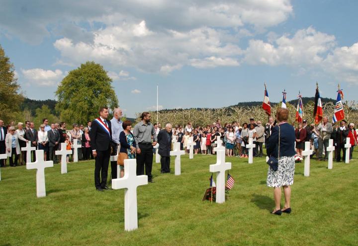 Attendees gather in the grave area for the adoption ceremony.