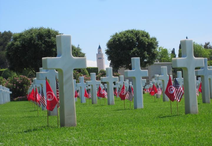 Flags at headstones at North Africa American Cemetery for Memorial Day 2012. 