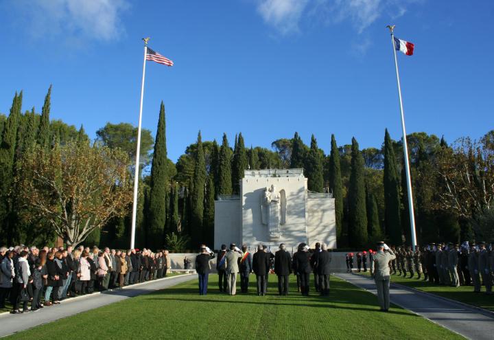 Participants and attendees face the chapel area during the ceremony. 