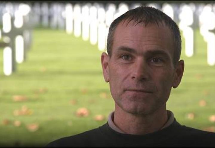 Screenshot from video shows Simonet amongst the headstones. 