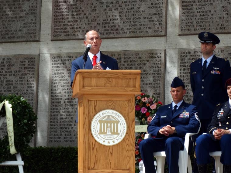 Ambassador Eisenberg delivers remarks from the podium. 