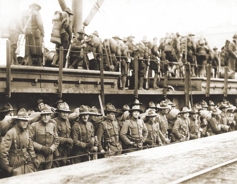 Soldiers of the U.S. 4th Infantry Regiment debarking from a ship at Brest, April 18, 1918.