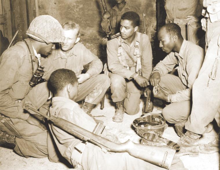 Officers of the 92nd Infantry Division plan crossing of the Arno River, Sep. 1, 1944.