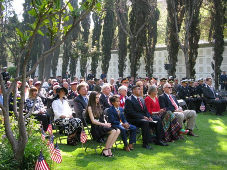 Attendees sit during the ceremony. 