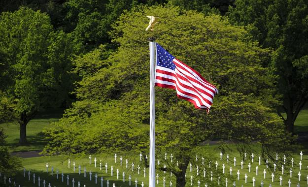 The U.S. flag flies over the graves at Lorraine American Cemetery